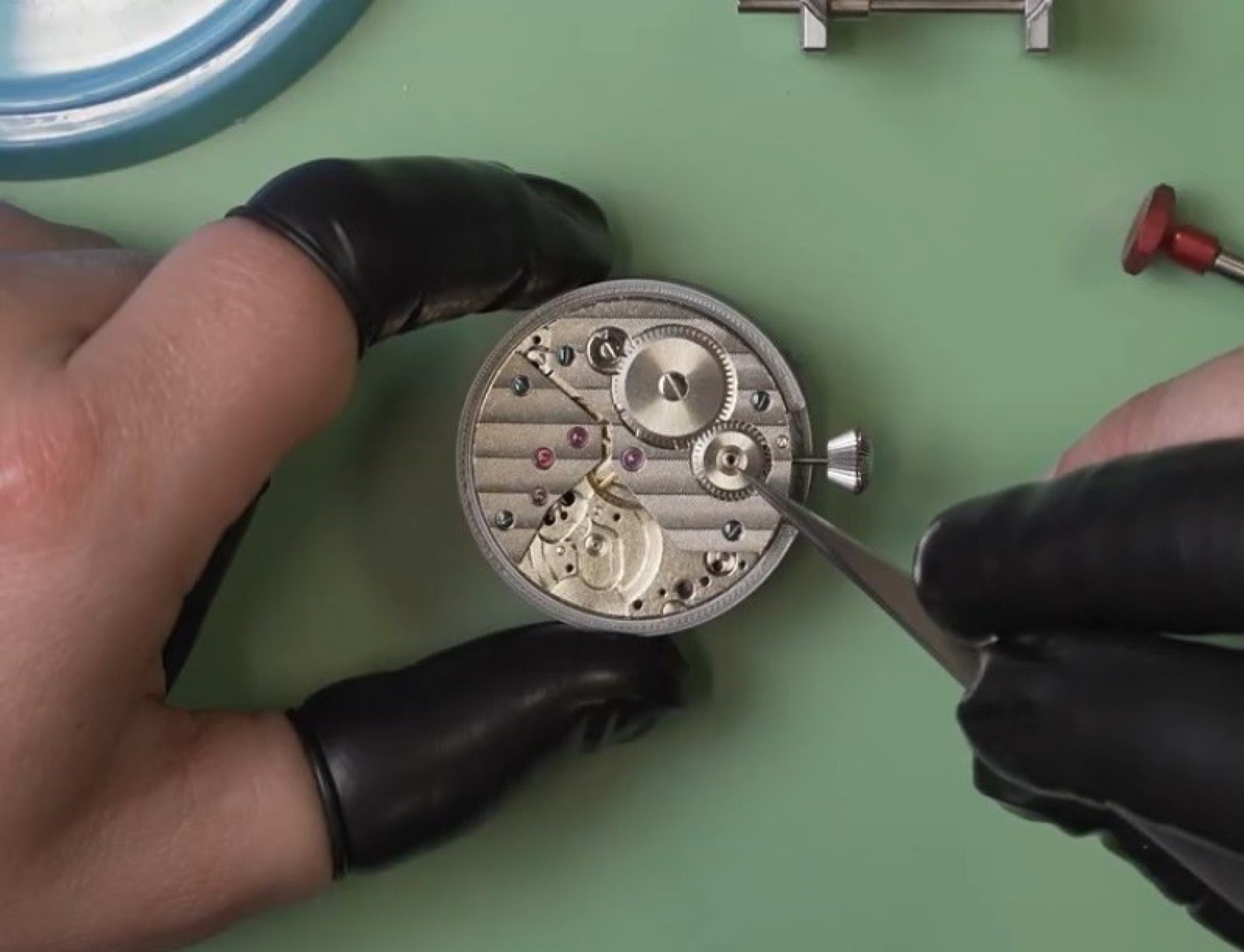 Taking apart a 6497 movement during the watchmaking course